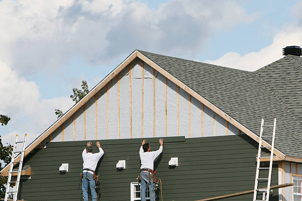 Professional Siding technician working in Freeland, PA
